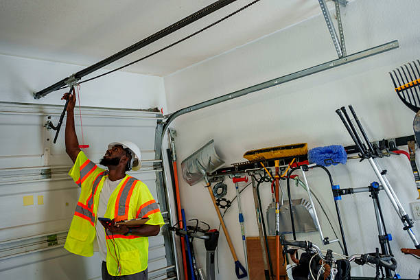 Professional Garage Door Panel Replacement technician working in Union City, NJ